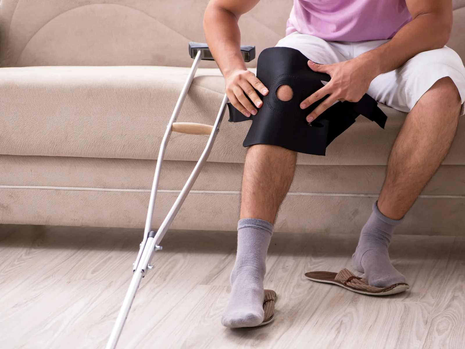 A client being fitted for equipment covered by a funding program