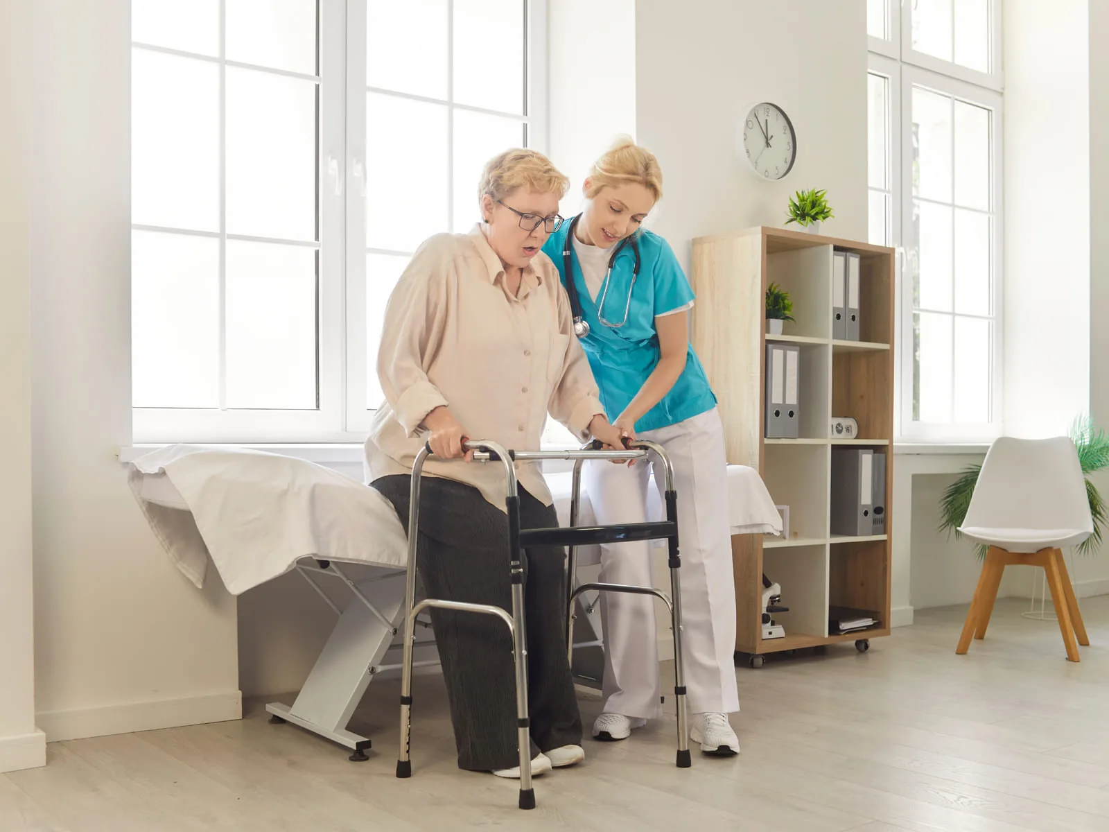 A specialist assessing a client's mobility needs