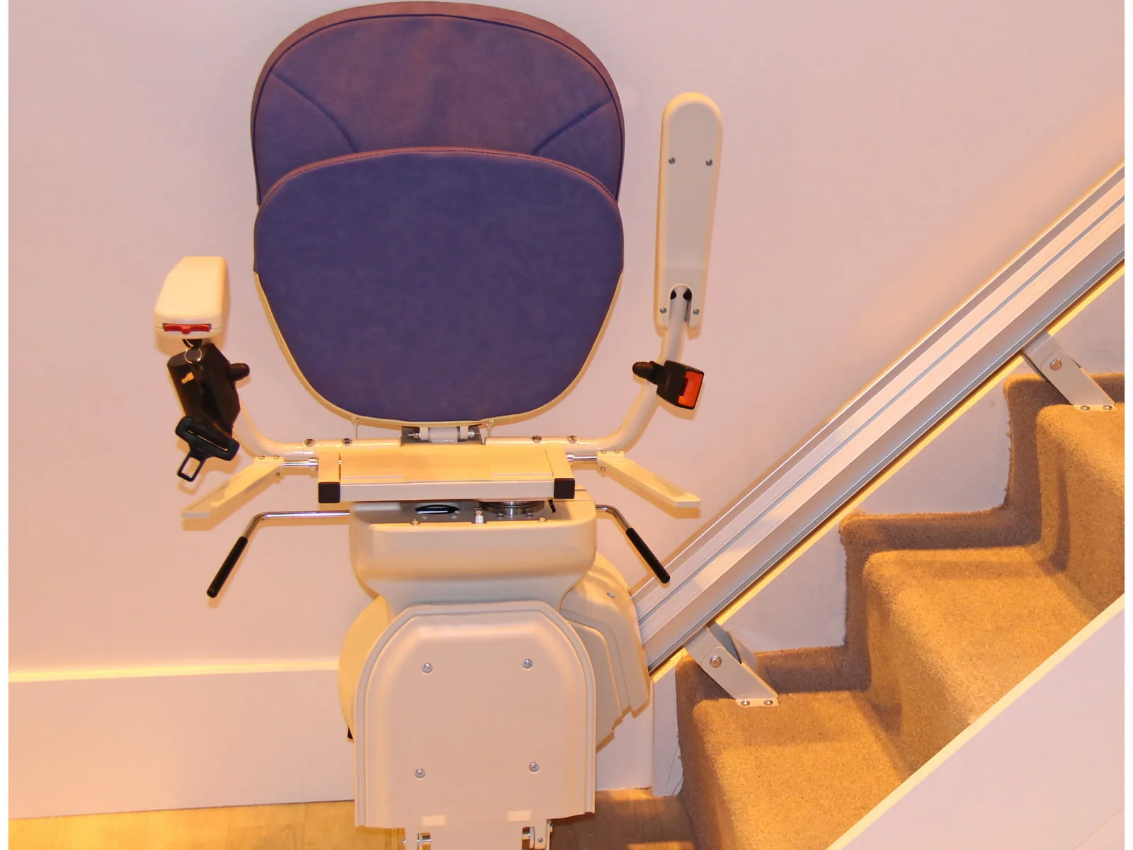 Stair lift seat, armrests, and safety belt — serviced in-house